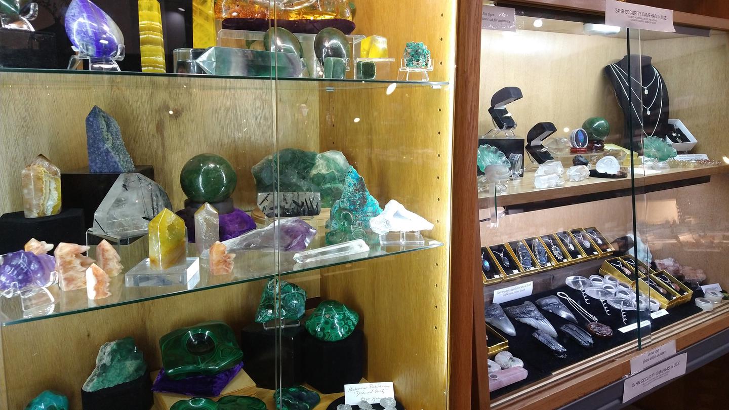 Glass cabinet containing various polished pieces
